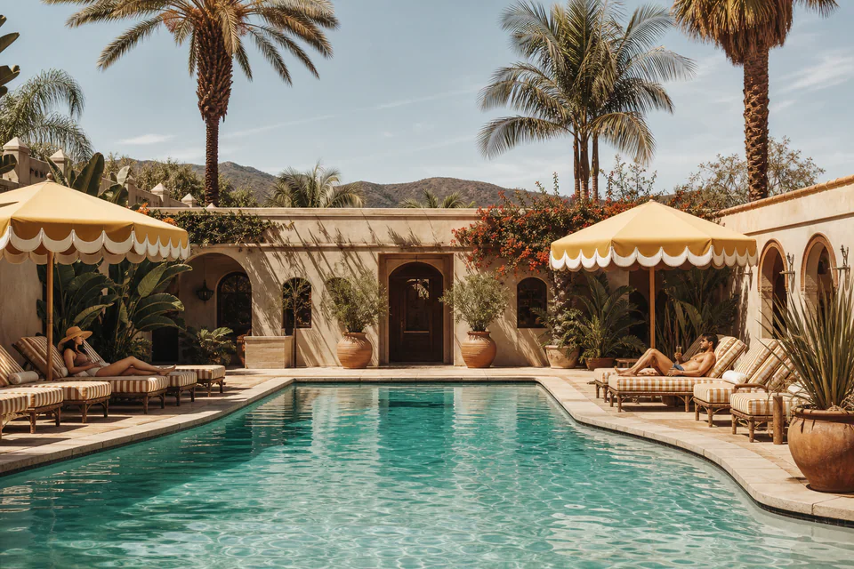 Striped poolside lounge at midday