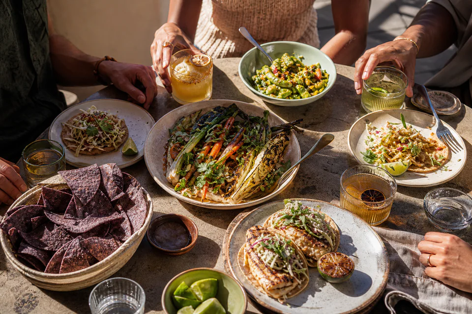 Colorful plates arranged for a shared meal